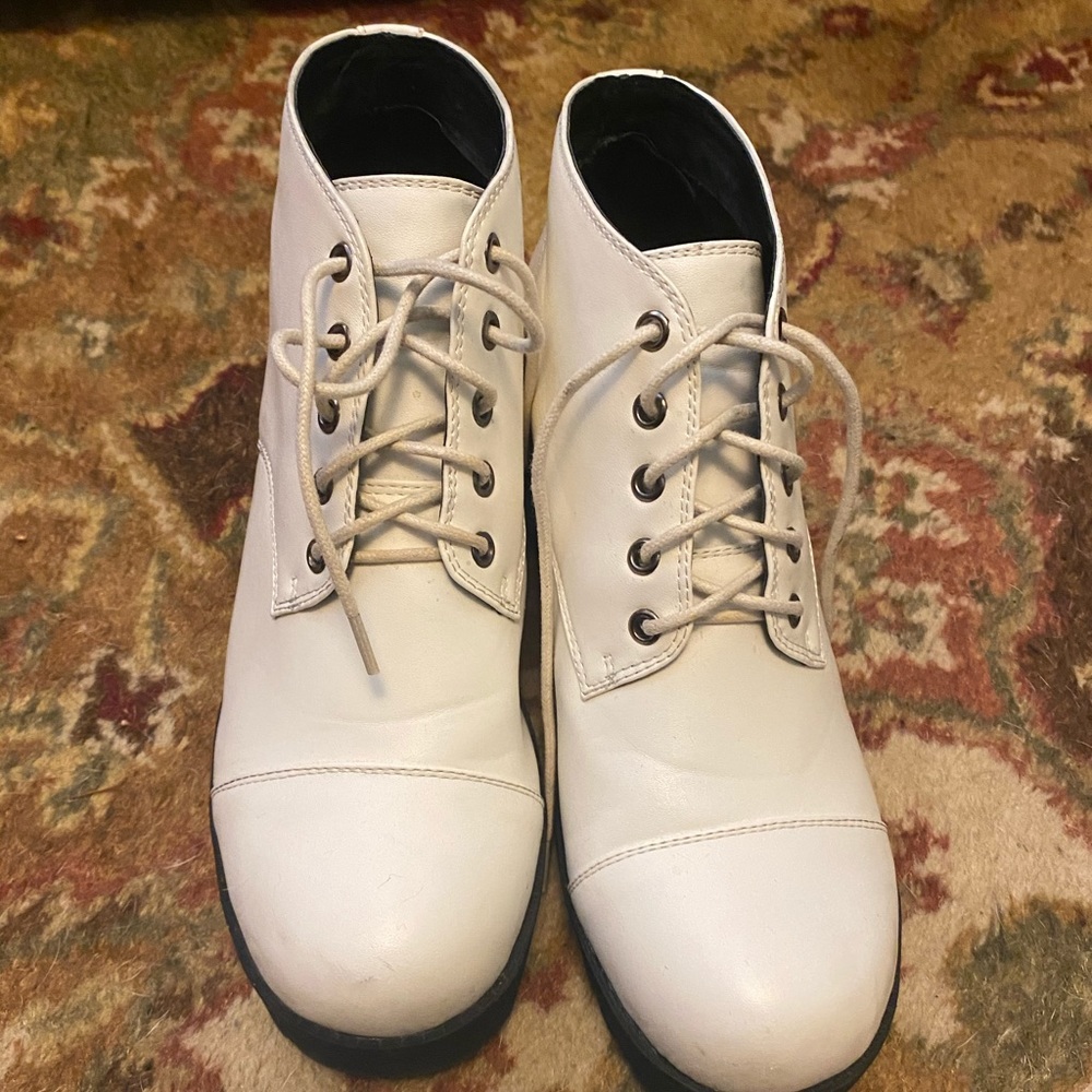 White, platform ankle boots.